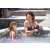 Two people relaxing in the Intex PureSpa Greywood Deluxe inflatable hot tub