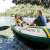 Family on Intex Seahawk 4 inflatable boat on a river