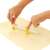 Tescoma DELÍCIA Pastry Cutter for Round Slices, white and yellow, adjustable size, in use