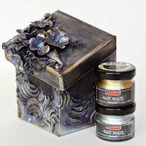 Fém díszítőelemek, amelyeket 3D hatás létrehozására használnak egy dobozon, két üveg viaszpasztával - Fém díszítőelem