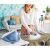 Woman using Tefal Pro Express Protect steam generator iron on ironing board