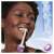 Woman using Oral-B Vitality Pro electric toothbrush, lilac