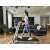 Woman walking on G-Runner T60 Compact Treadmill in modern apartment