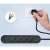 Black power strip with 4 AC outlets and 3 USB ports, 2 meter cable, plugged into a wall socket