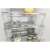 Interior view of Whirlpool WHC18 T573 built-in refrigerator shelves with food