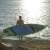 Man carrying HYDRO-FORCE AQUA EXCURSION TECH SUP inflatable stand up paddle board
