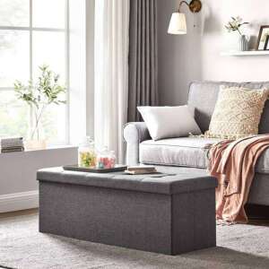 Grey storage bench with tufted top, perfect for adding extra seating and storage to your living room or bedroom - Furniture