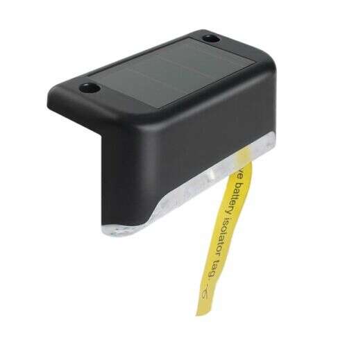 Black solar powered step light, angled view