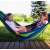 Two girls relaxing in a Gardlov Kerti XXL blue and green striped hammock