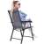 Woman sitting on Springos black and grey garden chair profile view