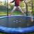 Child jumping on a trampoline