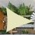 Springos beige triangle shade sail providing shade in a modern garden
