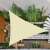 Springos beige triangle shade sail providing shade in a garden