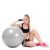 Woman posing with Springos grey gym ball