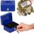 Blue metal cash box with key lock and handle, showing interior compartments and coins