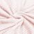 Swirled pink plush blanket texture