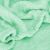 Close-up of Springos green embossed fleece blanket texture