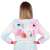 Springos unicorn Kigurumi onesie, pink and blue, with a rainbow tail and a unicorn head on the hood