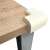 Springos Corner Protectors for Furniture, Cream, Installed on a wooden table