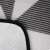 Springos picnic blanket, grey triangle pattern, close-up, waterproof layer