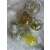 Assortment of Springos clear Christmas ornaments with gold and yellow accents.
