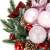 Pink Christmas tree ornaments on a Christmas wreath