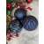 Selection of navy blue Springos Christmas tree ornaments with festive decor