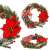 Springos karácsonyi koszorú piros szalaggal, tobozokkal, piros bogyókkal és karácsonyi csillaggal, több szögben