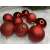 Springos 6 cm red Christmas tree baubles, 3 different finishes: matte, shiny, and glitter.