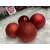 Springos 6 cm red Christmas tree baubles, 3 different finishes: matte, shiny, and glitter.