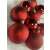 Springos 6 cm red Christmas tree baubles, 3 different finishes: matte, shiny, and glitter.