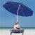 Woman relaxing under Springos blue beach umbrella