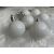 Several white Christmas tree ornaments
