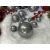 Various sizes of Springos pearl gray Christmas ornaments on display