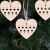 Springos wooden heart ornament hanging on Christmas tree