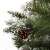Springos artificial Christmas tree branch with snow-frosted tips and pine cone