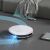 TESLA RoboStar iQ400 robot vacuum cleaner in action cleaning floor