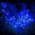 Springos blue LED string lights decorating flowers, decorative lighting