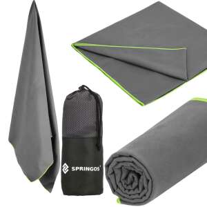 Springos quick-drying towel in gray with green trim, rolled up, unfolded, and with a carrying bag - Towel
