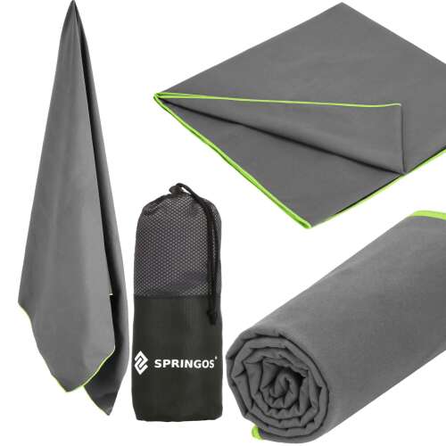 Springos quick-drying towel in gray with green trim, rolled up, unfolded, and with a carrying bag