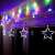 Springos star curtain lights, 92 LED, multicolor, hanging on a window