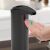Vog & Arths automatic soap dispenser dispensing soap