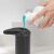 Filling Vog & Arths automatic soap dispenser with liquid soap