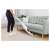 Woman using Sencor SVC 7811WH cordless stick vacuum cleaner on carpet