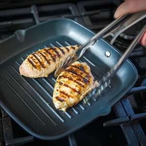 Stellar Cast Square Grill Pan with Non-Stick Coating, 26x26 cm, showing chicken breasts being grilled - Cookware & bakeware