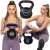 Kettlebell Springos 10kg, čierna, zobrazené sú dve kettlebell, žena sedí s nimi