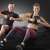 Two people using Springos 10kg kettlebells for workout