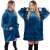 Springos oversized blanket hoodie in blue and white, worn by a woman, showing the front and back