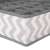Close-up of the corner of the Springos drawer organizer, showing the grey and white chevron pattern