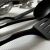 Close-up of kitchen utensils on Springos anti-slip drawer liner